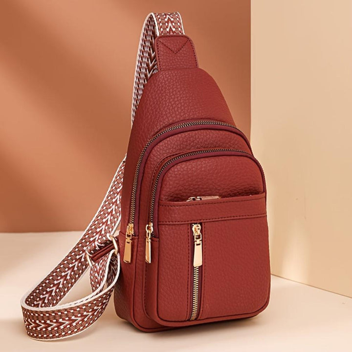 "Fiona - Torba s remenom i kotačićima" could be rewritten as "Fiona - Torba s kotačićima i podesivim remenom".